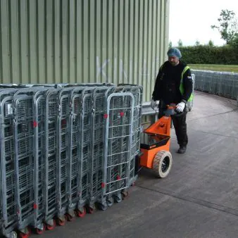 Dairy roll cage mover